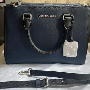 Michael Kors selma satchel in Saffiano 2 tone leather with silver hardware.